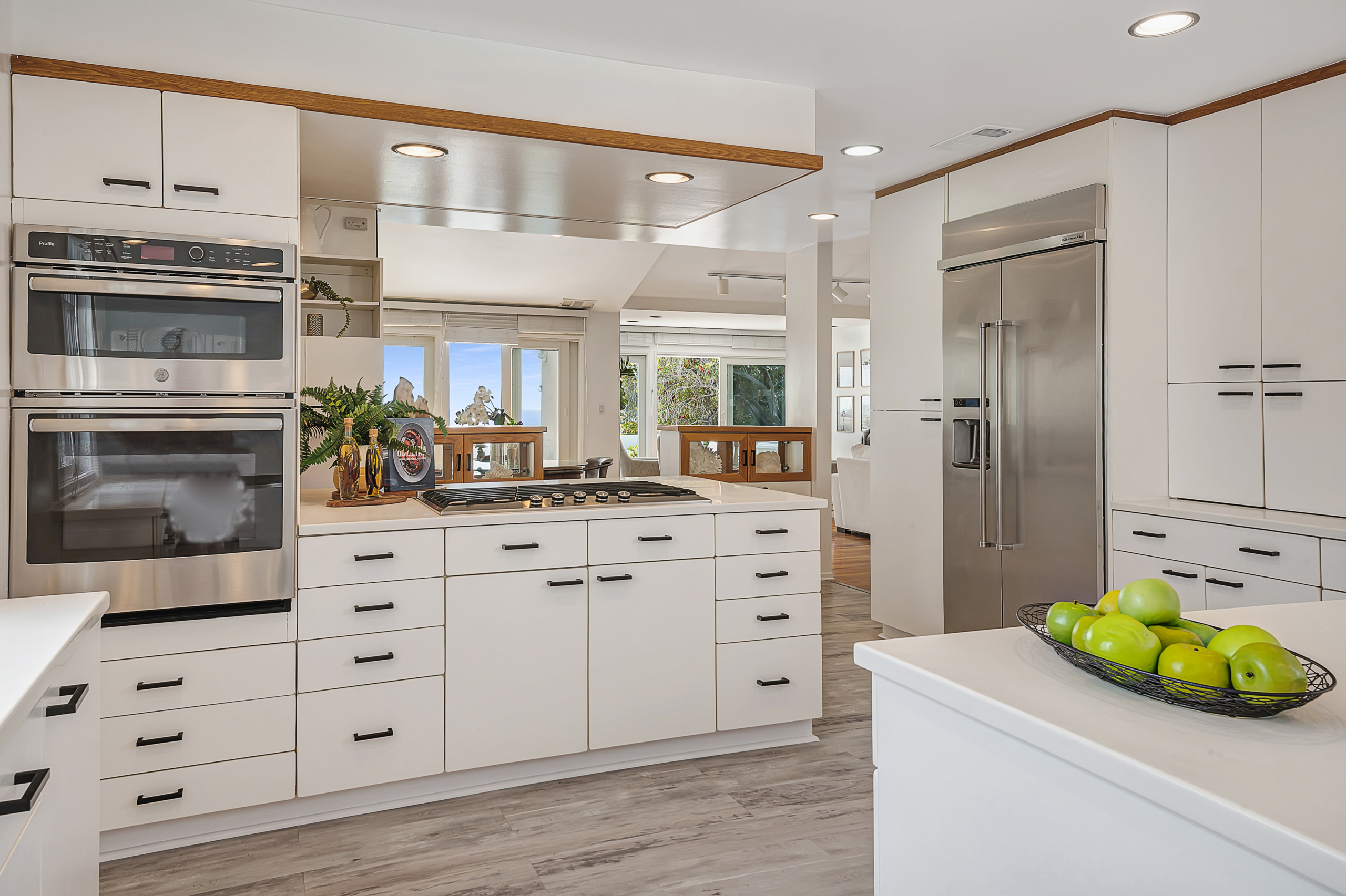 bright modern kitchen with stainless appliances