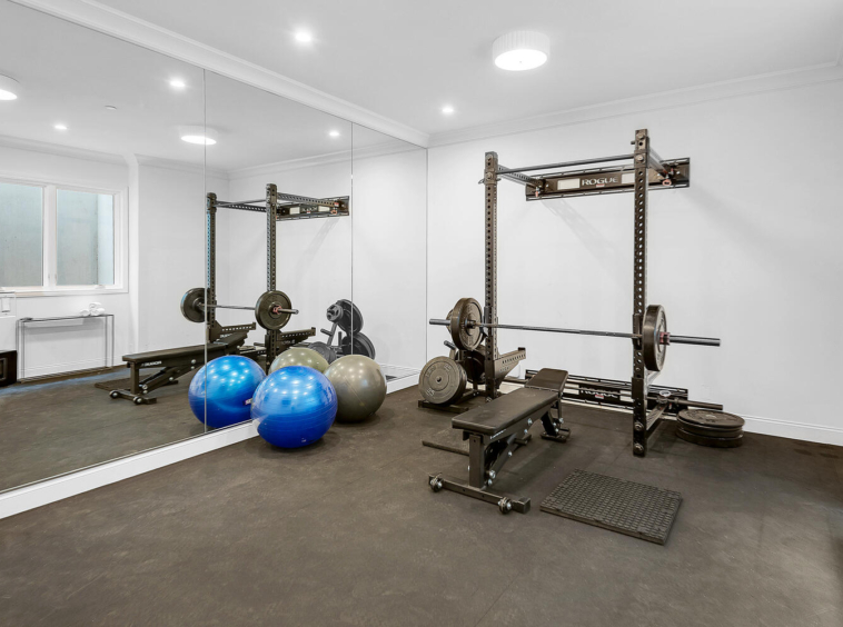 Home gym and large floor-to-ceiling mirrors