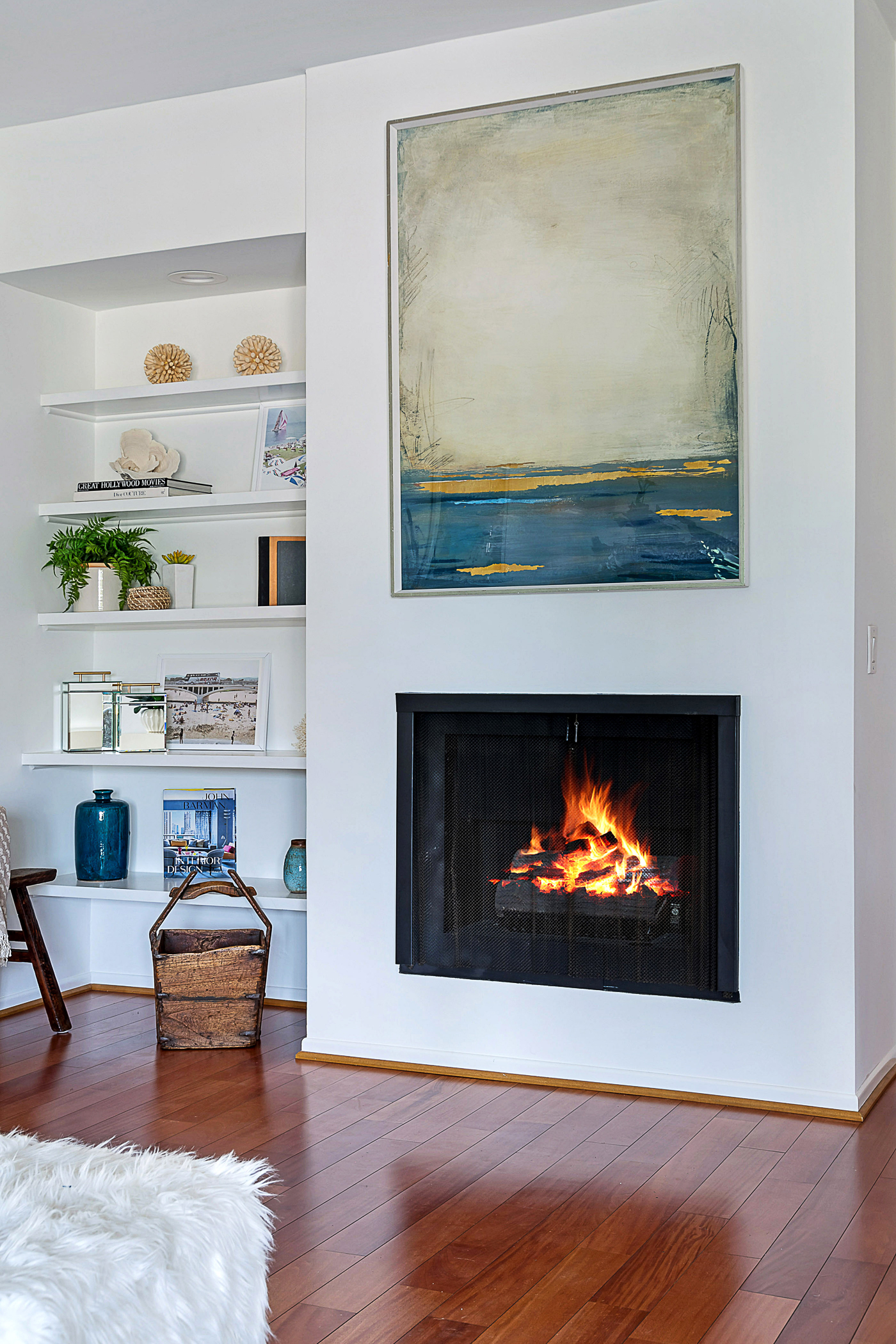 Built-in cabinets and modern in-wall fireplace