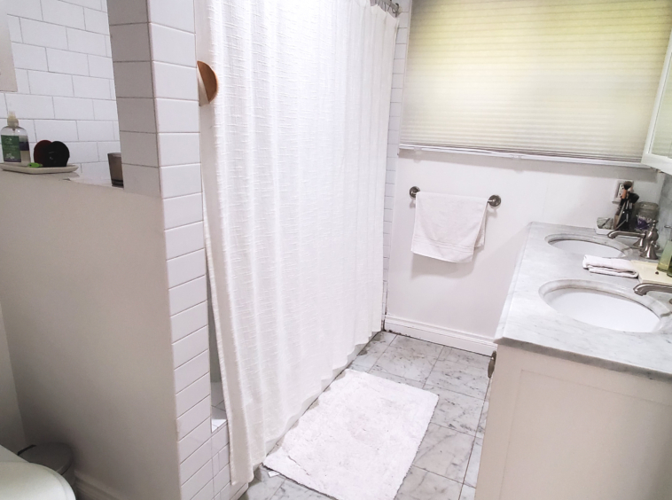 White bathroom with walk-in shower