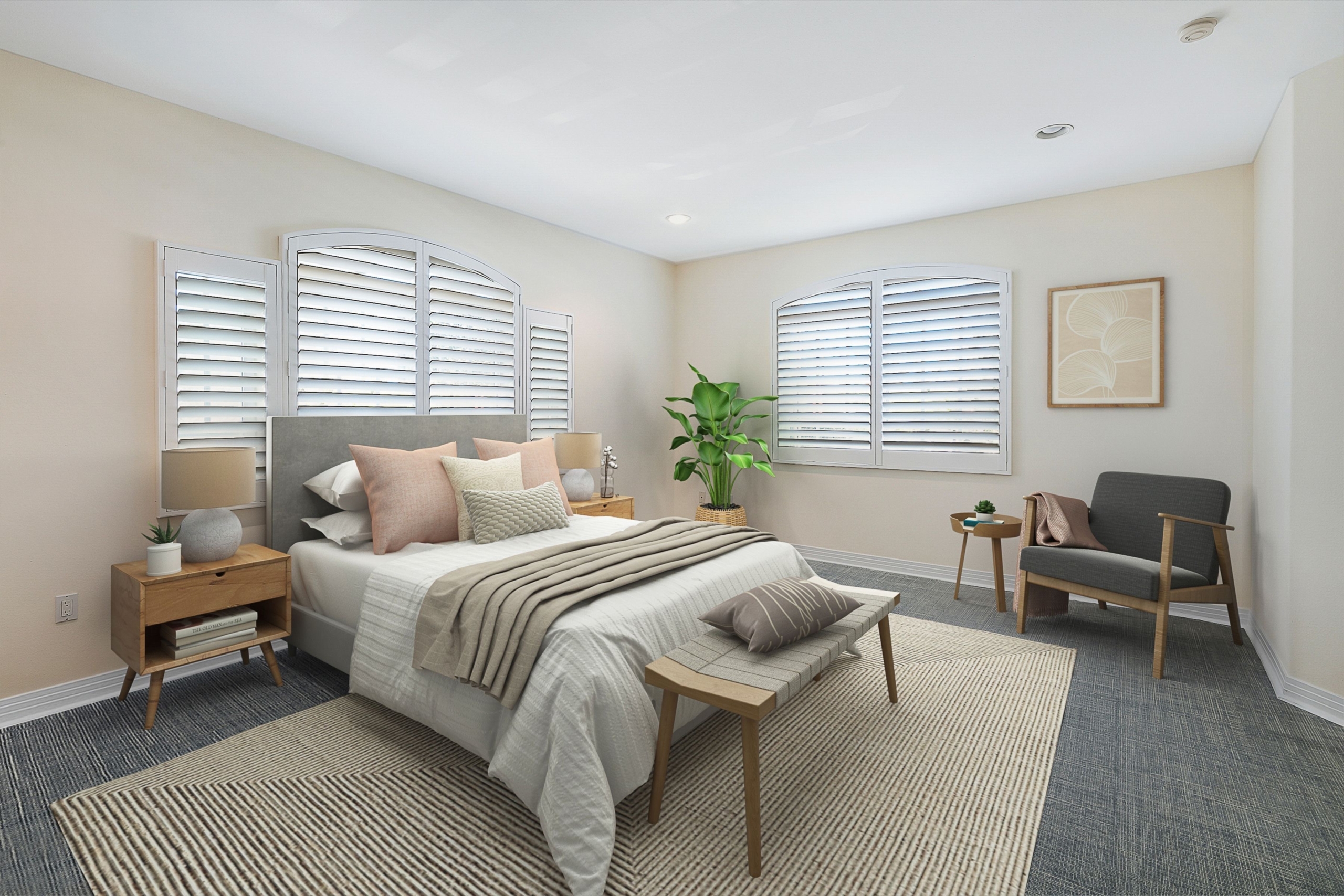 Cream bedroom with grey carpet and blinds over windows