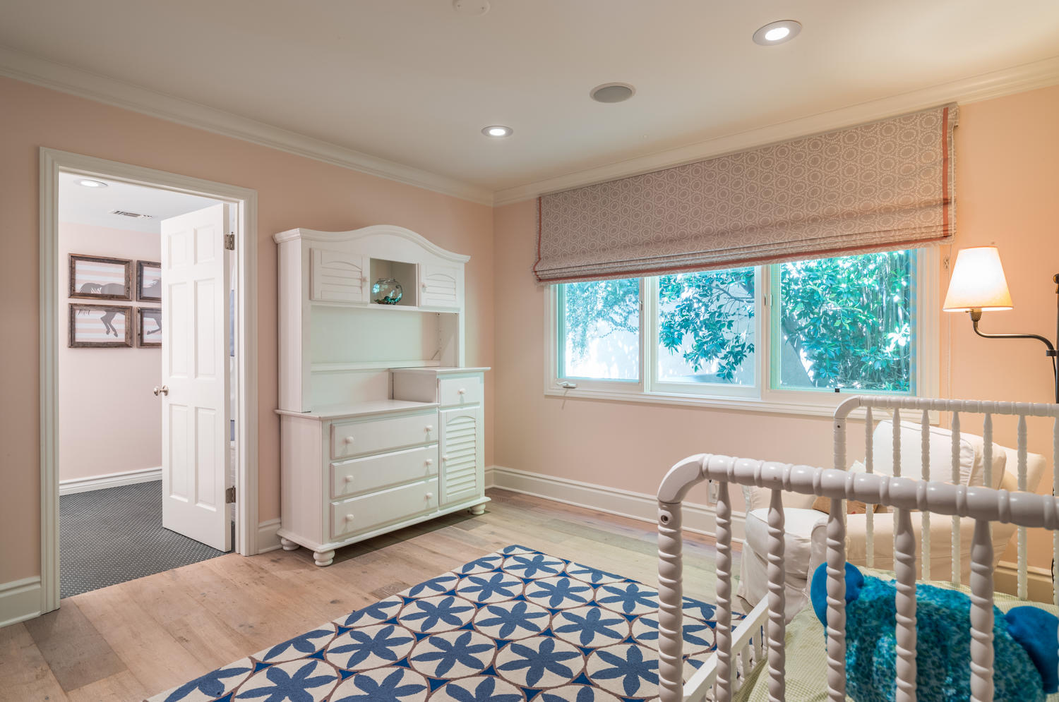 Baby's room with crib and dressing table
