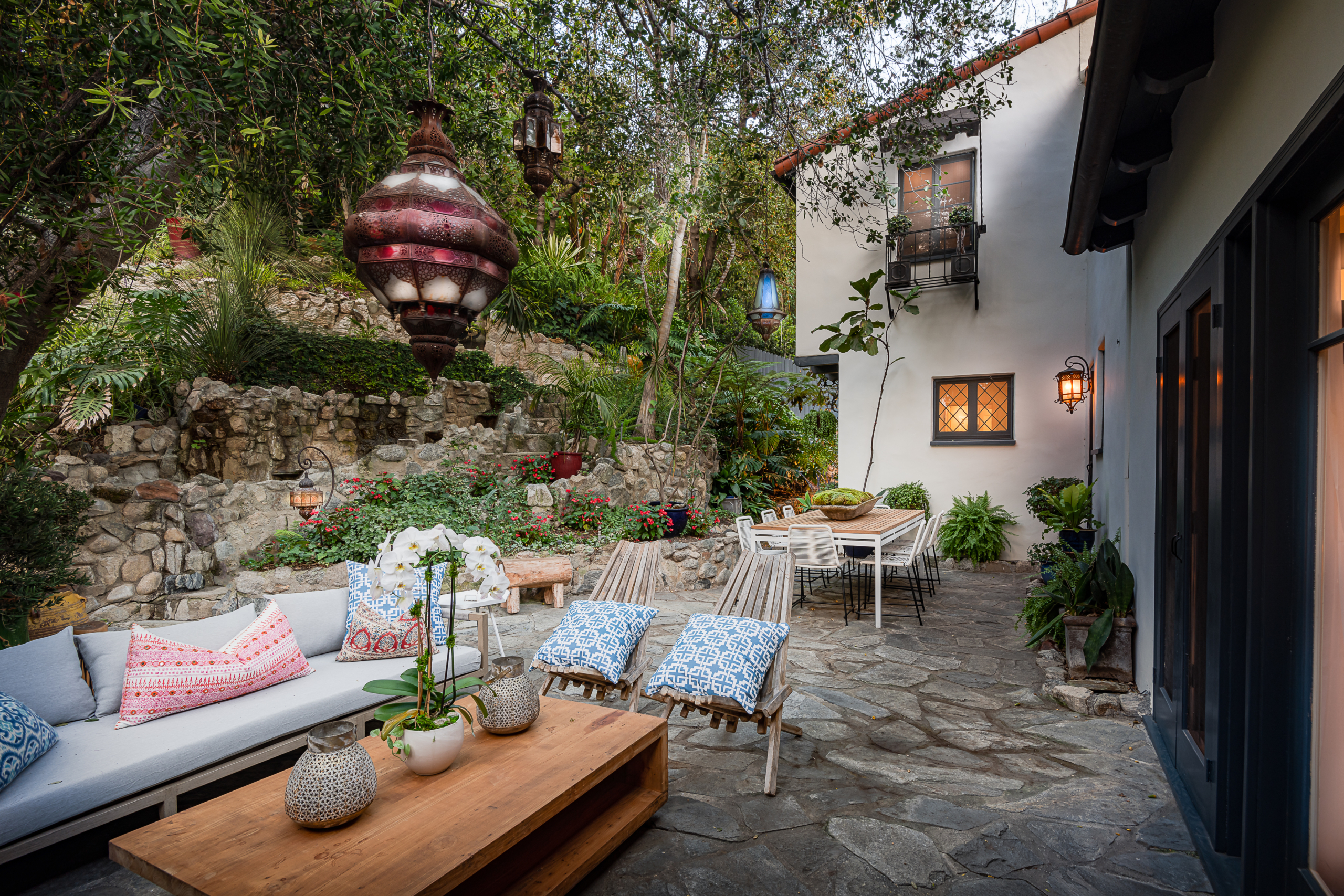The stunning Moroccan lantern-lit entertainer's yard is ideal for al-fresco Dining, the hillside gardens and fountain beckon the avid gardener and all in search of a meditative retreat.