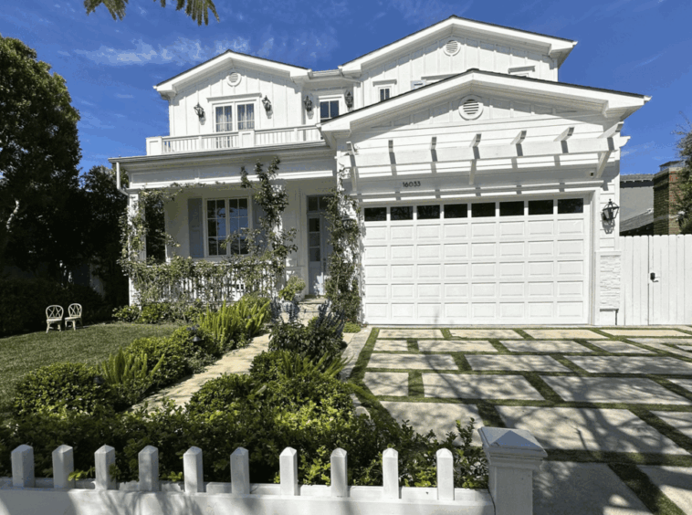 White traditional home exterior featuring 6 Bedrooms and 7 Bathrooms + Casita