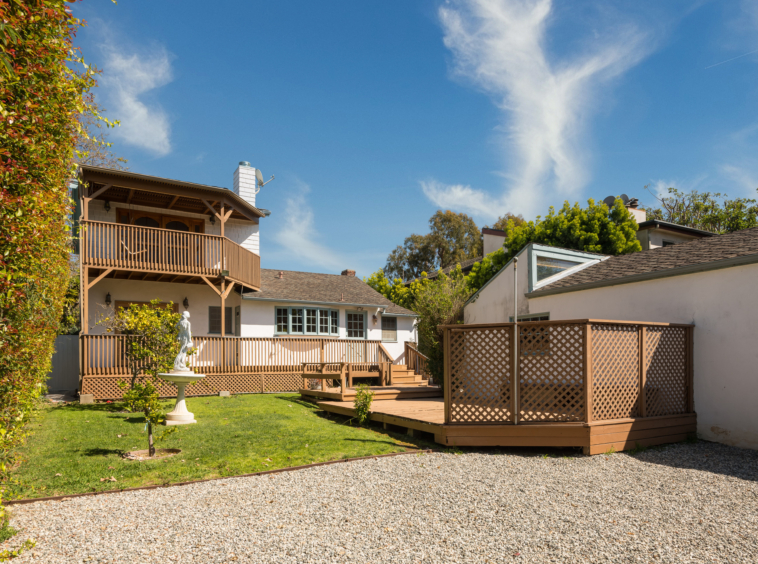 367 N GRENOLA Garage and yard with two-story deck space.