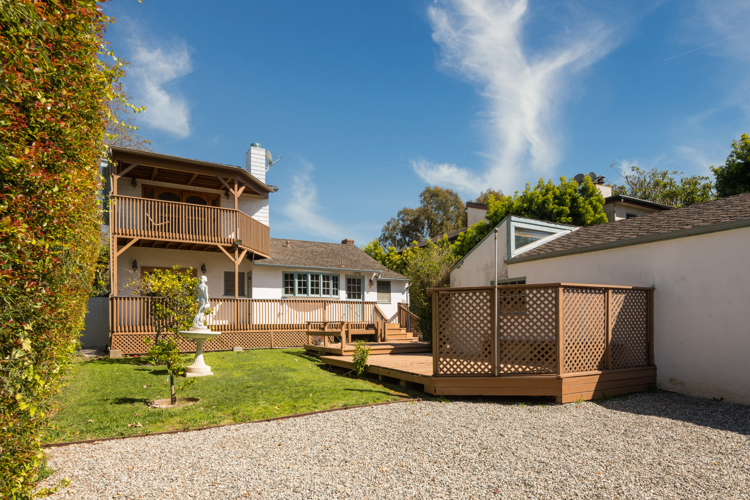 367 N GRENOLA Garage and yard with two-story deck space.