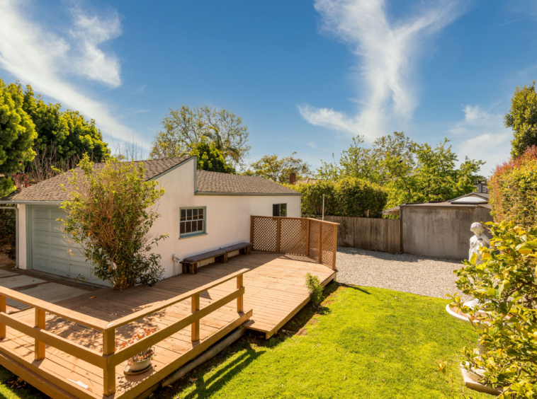 367 N GRENOLA Garage and yard with deck space.