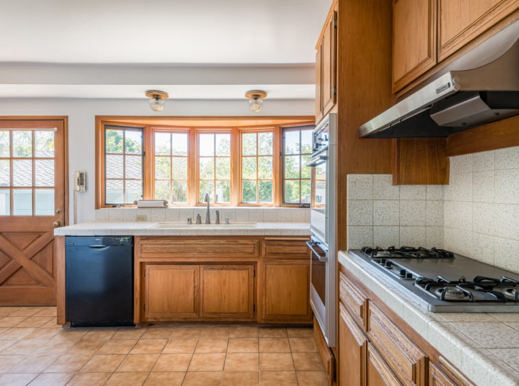 367 N GRENOLA Kitchen with Spanish ceramic tiles and oak cabinets