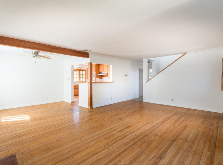 367 N GRENOLA Living Room with antique hardwood flooring and white walls