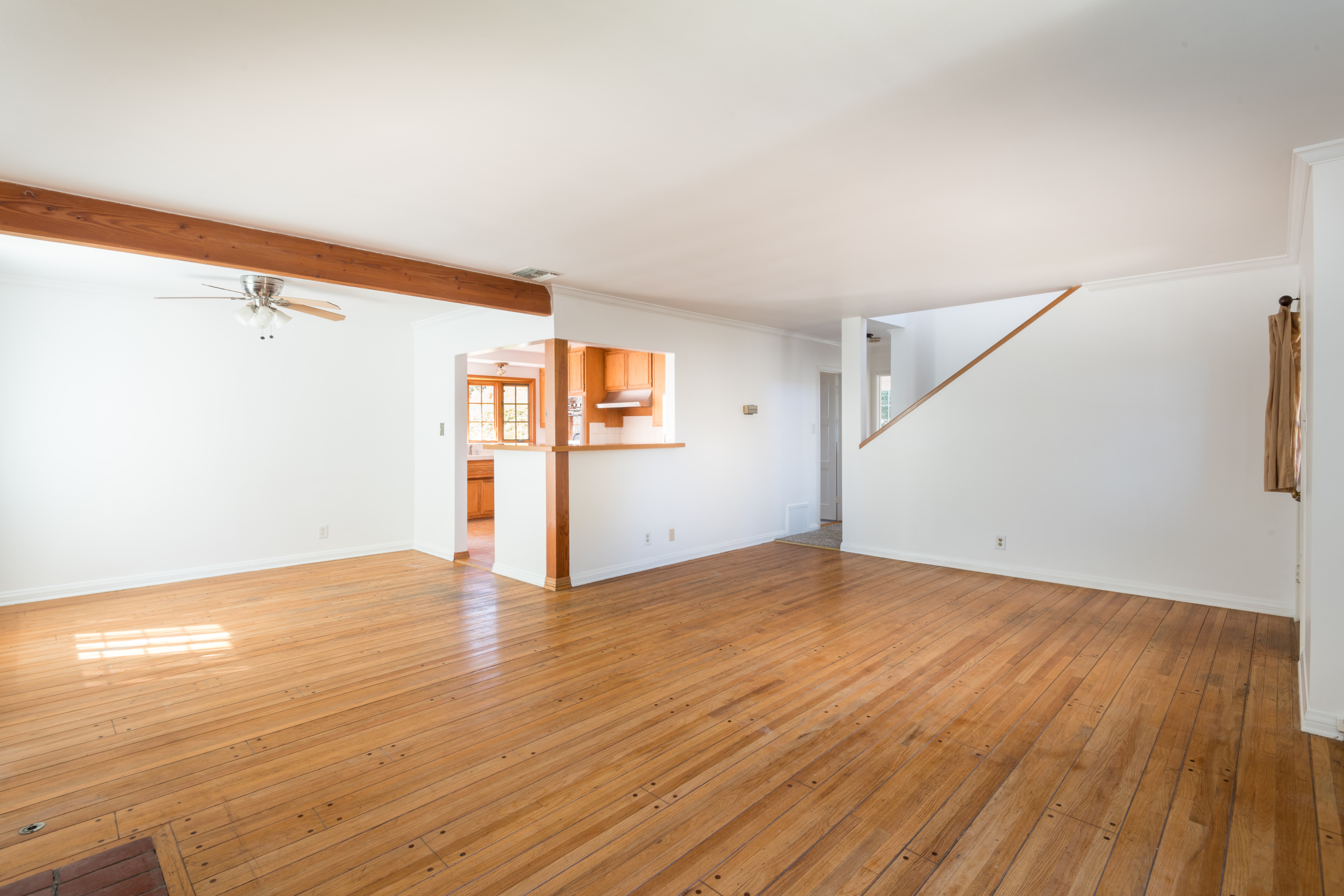 367 N GRENOLA Living Room with antique hardwood flooring and white walls