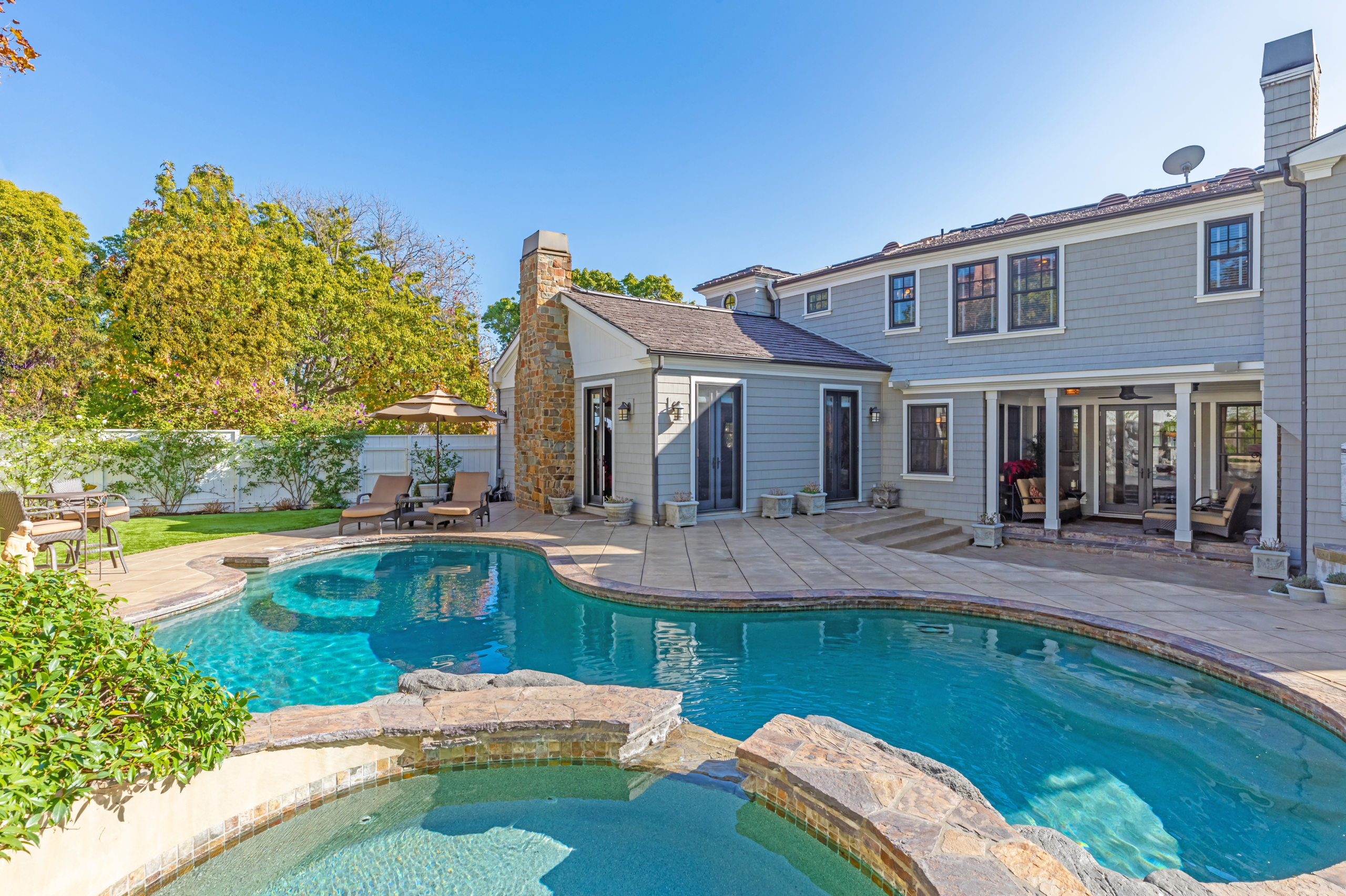 Gorgeous home and pool with large masonry patio