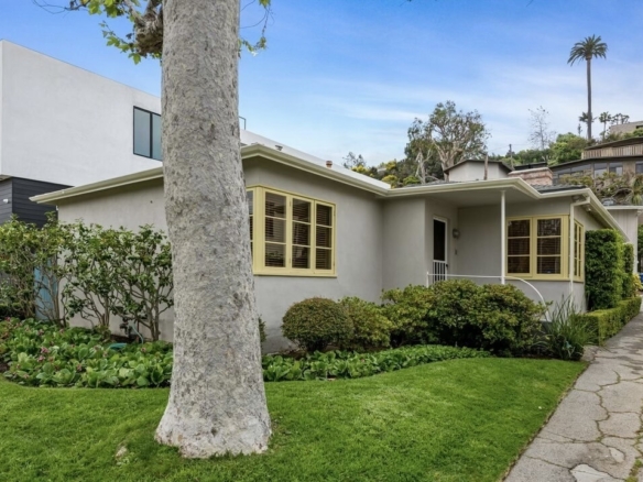 Contemporary home with yellow trimmed windows