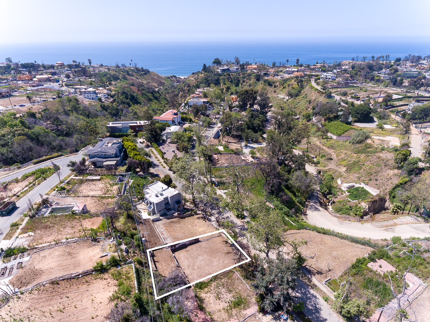 630 Bienveneda Ave-aerial view of lot, neighborhood and ocean in Pacific Palisades