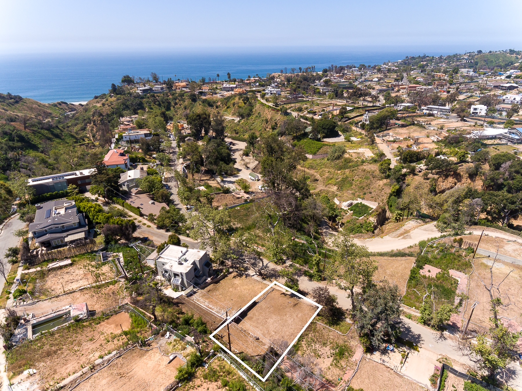 630 Bienveneda Ave-aerial view of lot, neighborhood and ocean in Pacific Palisades